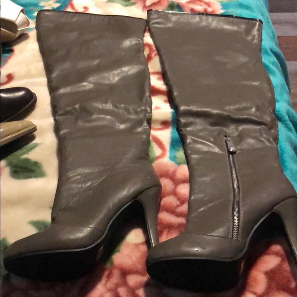 Mark. Knee high boots.